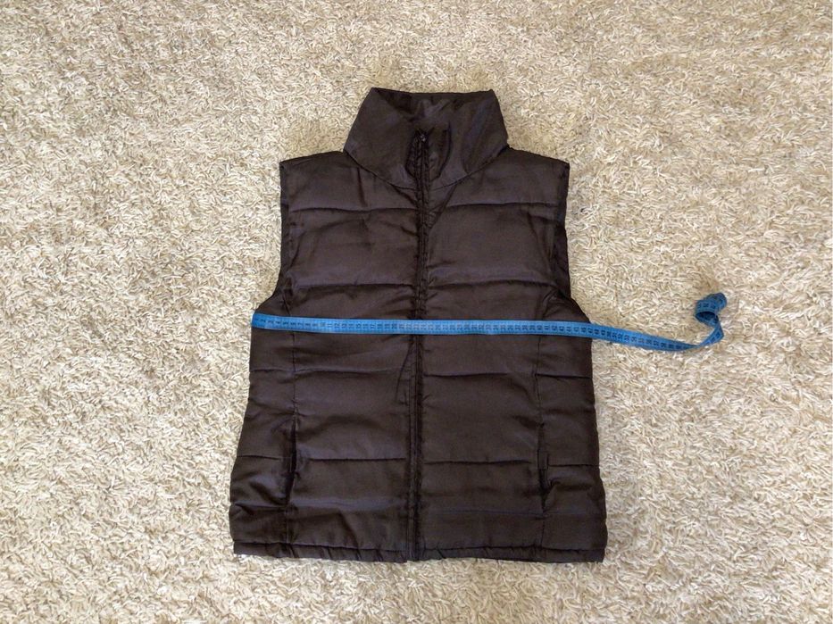 Жилетка теплая.