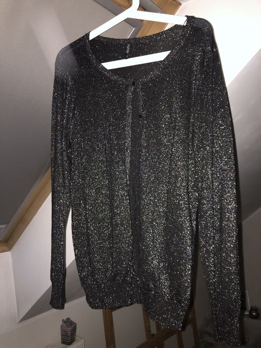 Sweterek M.                                .