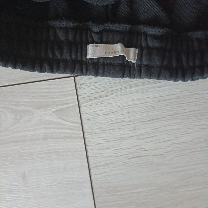 bawełniane spodnie jogger Reserved 146