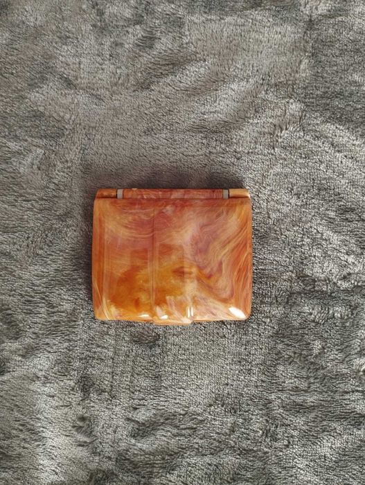 Espelho compacto com luz