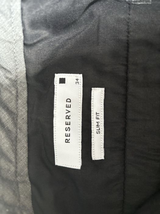 Szare męskie spodnie Reserved