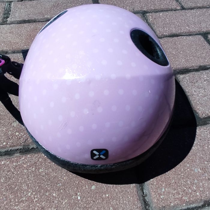 Kask rowerowy dziewczęcy B'TWIN, różowy w groszki z kokardą, 48-52 cm
