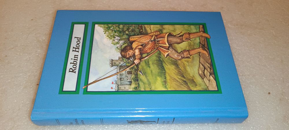 Livro Robin Hood - livro de 1992
Livro de capa dura azul Robin Hood de 1992