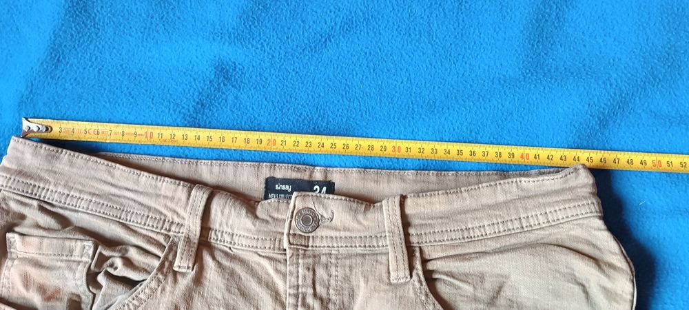 Spodnie jeans piaskowe sinsay 34