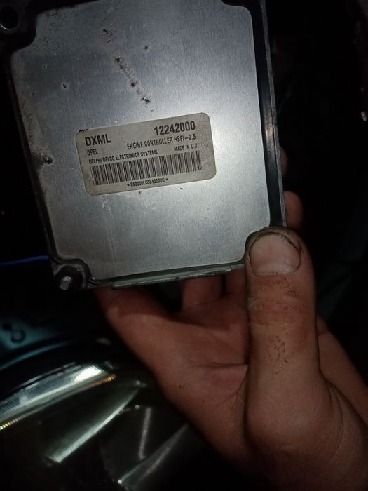 12242000- ЭБУ Opel Meriva