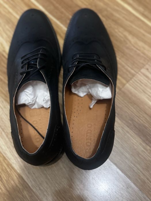 Нові чоловічі туфлі