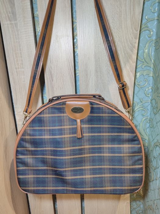Дорожная сумка в клеточку бренда Stentor