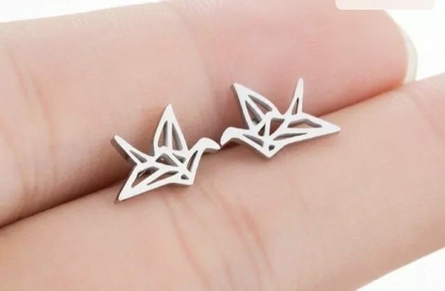 Brincos aço pássaro. Novos