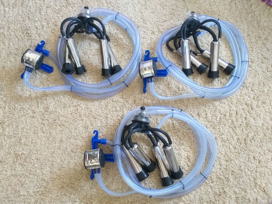 Подвісна частина попарного доїння для молокопроводу, доїльний апарат