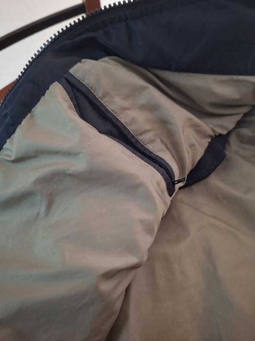 Colete com capuz impermeável