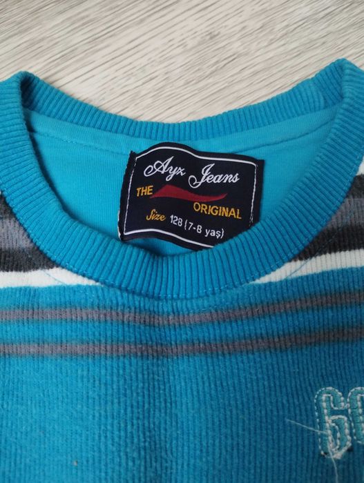 Sweterek roz. 128