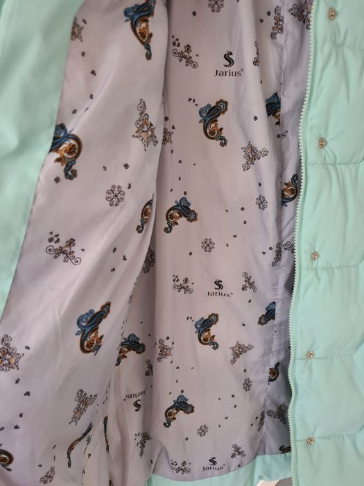 Пуховик в ідеальному станні