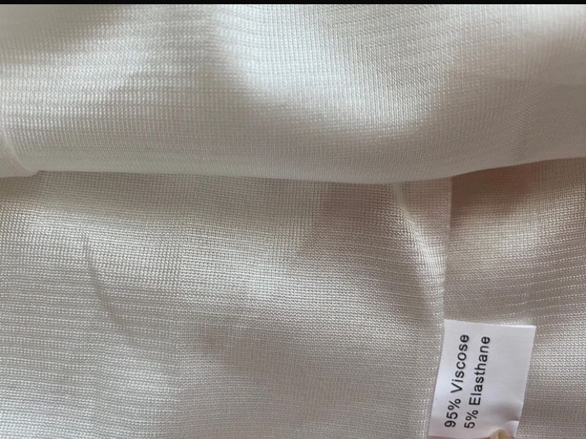 Biała spódniczka z czarnym pasem XS