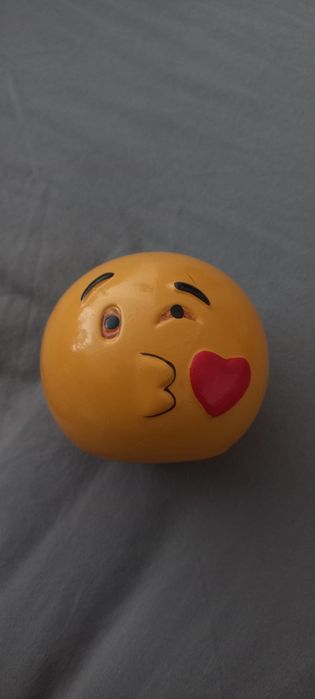 Emoji-shaped piggy bank