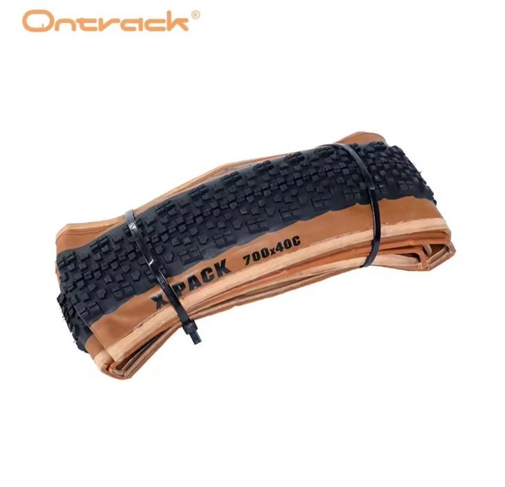 Opona zwijana Ontrack X-Pack 700x40C ETRTO: 42-622 30TPI 570g Brown Wall Nowa