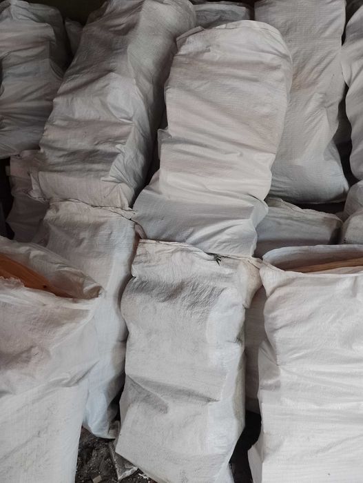 Дрова сухі в мешках