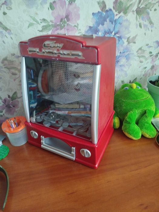 Штовхав монет ігровий автомат