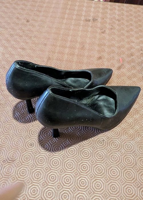 Sapatos de salto alto