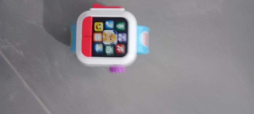 Zabawka zegarek Fisher Price grający