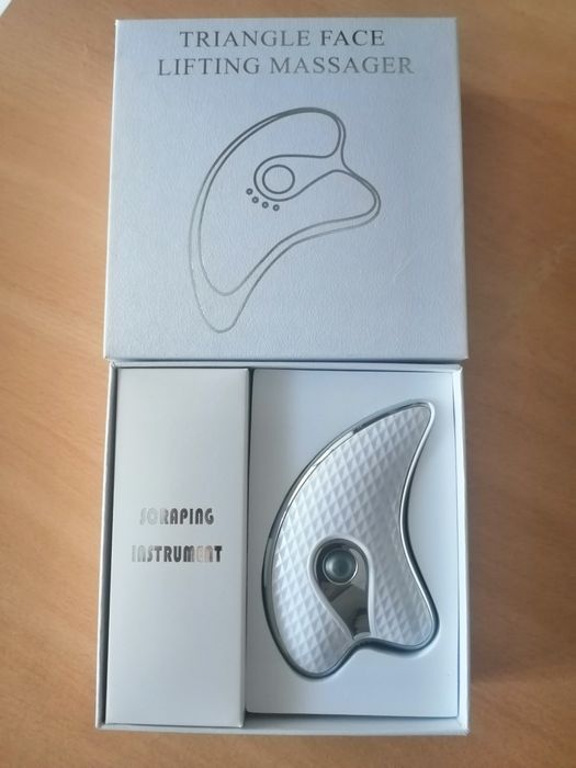 Massajador Facial Novo