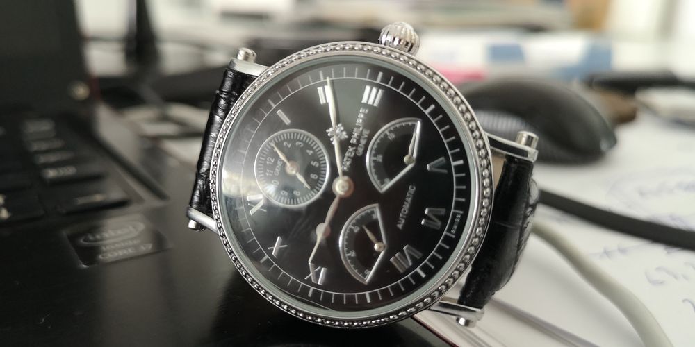 Relógio Patek Philippe com duplo horário.64740289042689121