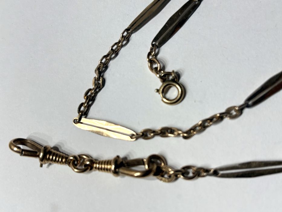 Antigas correntes de relógios de bolso em metal dourado