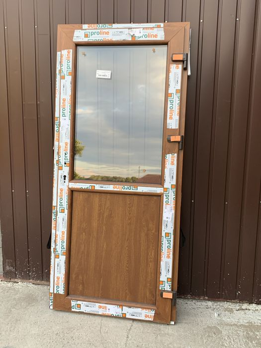 Drzwi PCV 110x210 złoty dąb