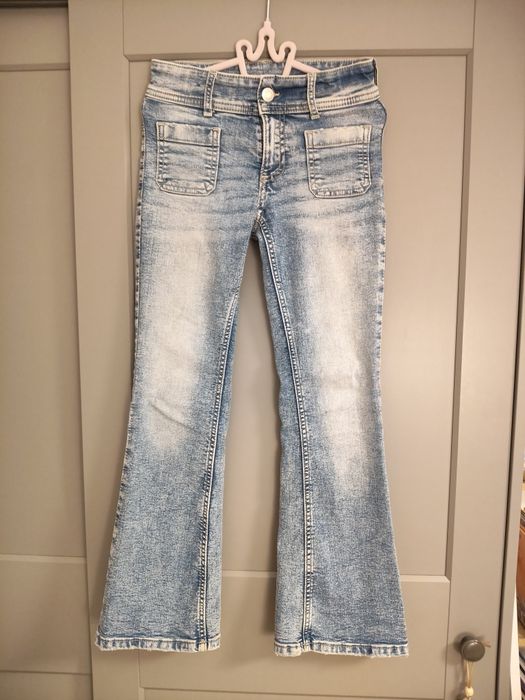 H&M spodnie dla dziewczynki dżinsy dzwony flared leg, 134