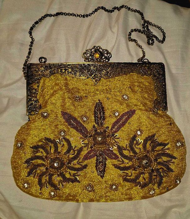золотиста вінтажна сумка