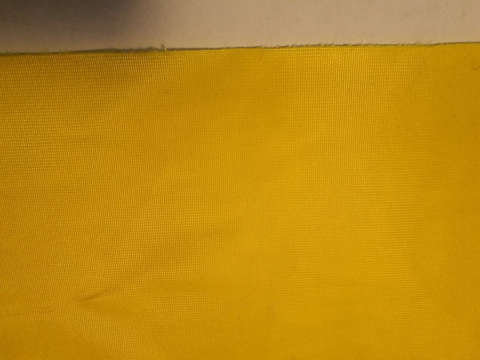 Tkanina stylonowa żółta szer.160 cm.