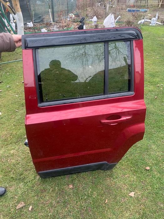 Jeep Patriot пасажир задні  двері оригінал