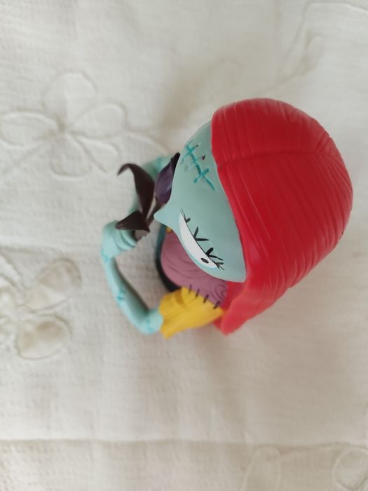 Mealheiro em forma de busto da Sally, representando a icónica personag