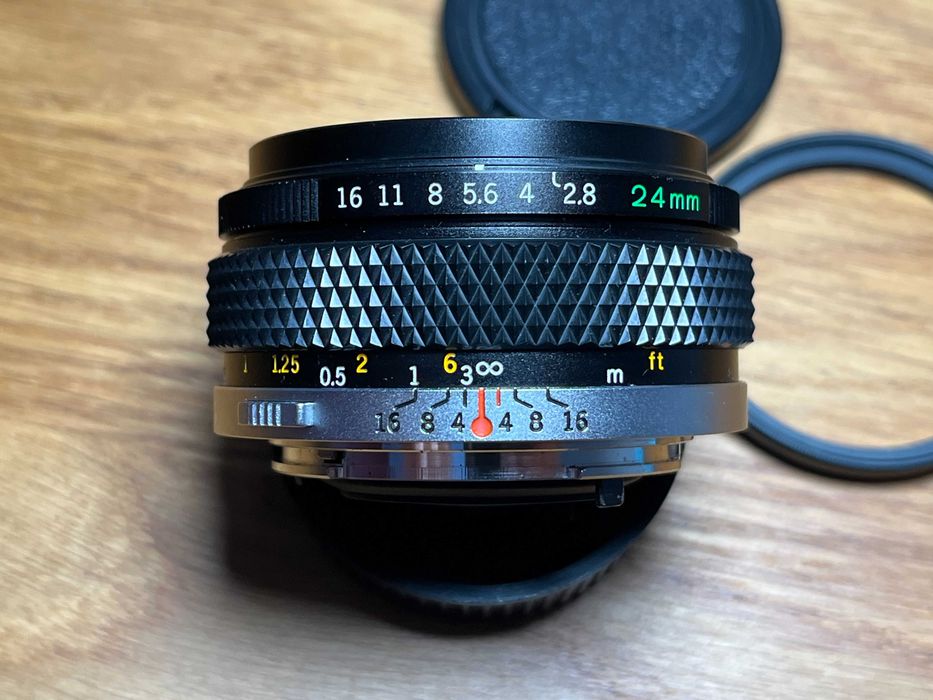 Olympus OM Zuiko Japan 24mm f/2.8 NMC idealny