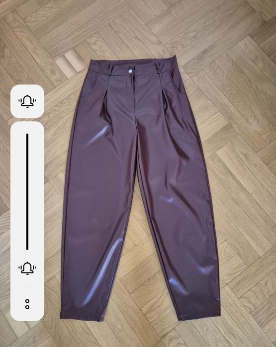 Одяг з екошкіри бордовий або винний колір