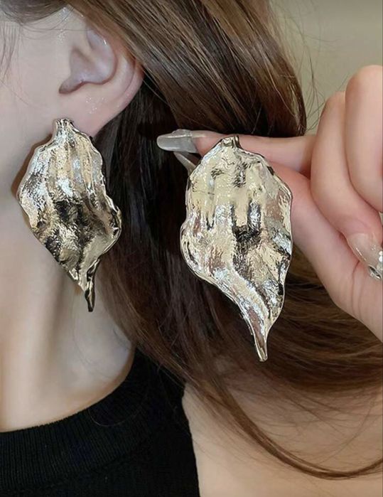 Kolczyki damskie nowe w kolorze srebrnym