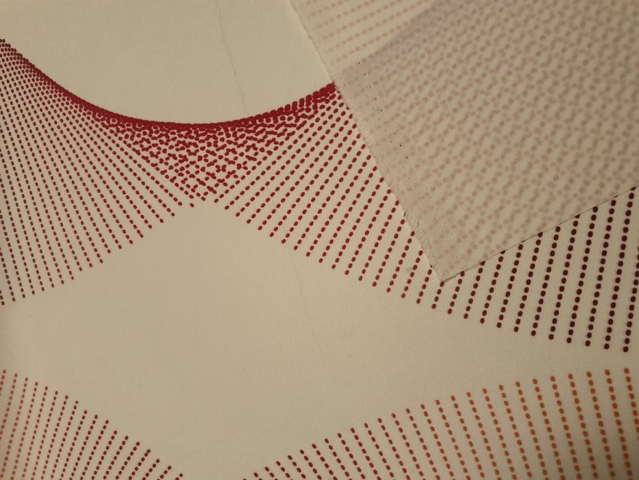 Tkanina zasłonowo-obrusowa biała ze wzorem szer.148 cm.