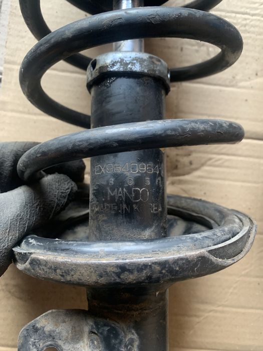 Передние стойки амортизаторы Шевроле Авео заз вида опоры пружины СТО