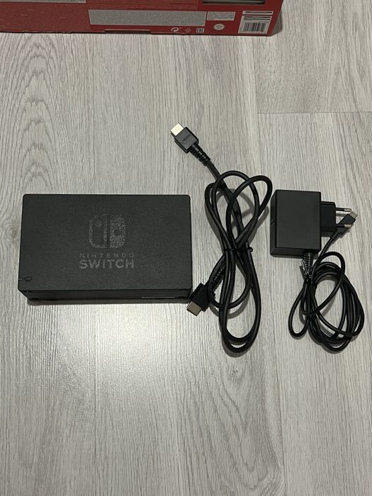 Zestaw Nintendo Switch + 2 gry + paletki