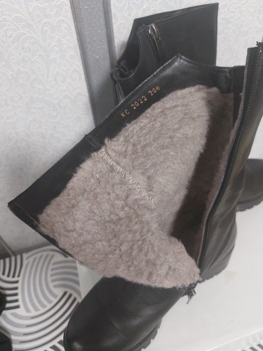 Женские кожаные сапоги