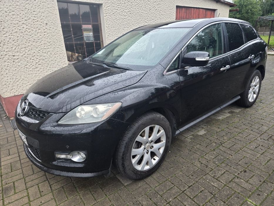 Mazda cx-7.  2.3 benz + GAZ