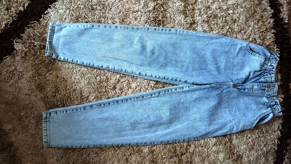 Сині жіночі джинси