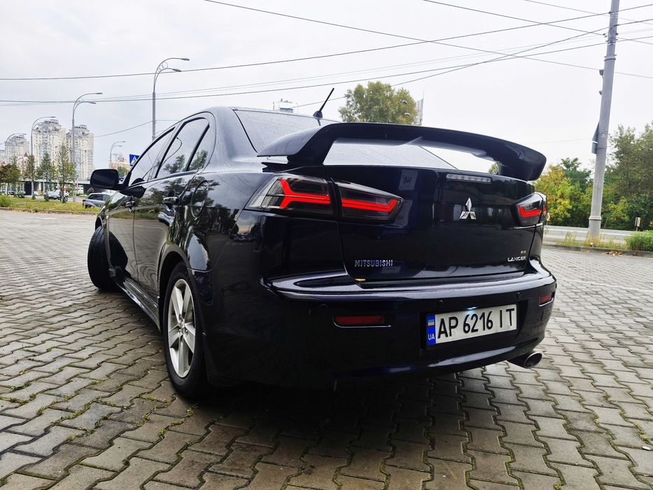 Митсубиши Лансер Х