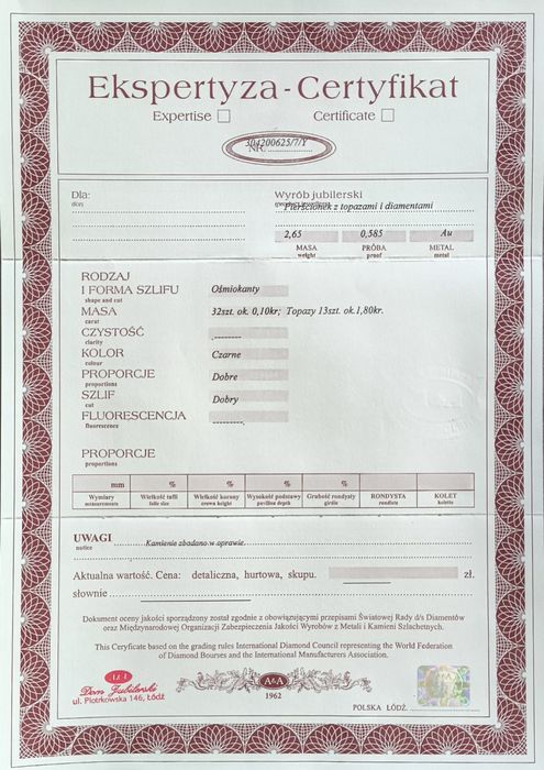 Złoty pierścionek z brylantami i topazami