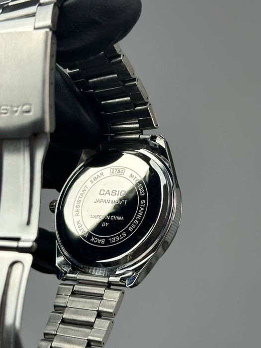 Годинник Casio MTP-1302/Часы касио