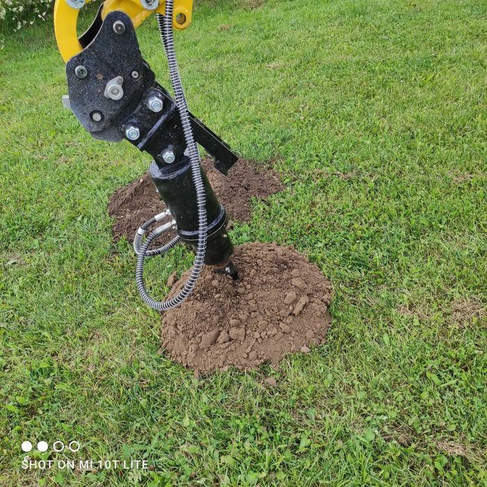 Ogrodzenia betonowe, minikoparka ,Słupki betonowe, montaż