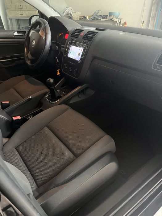 Golf V de 2004, gasolina, 242672 km