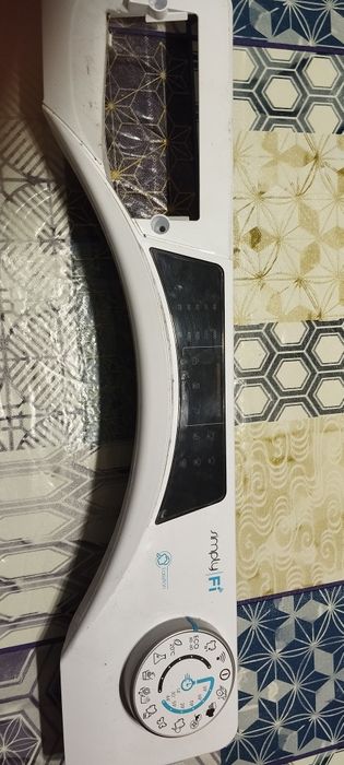 Painel frontal da máquina de lavar