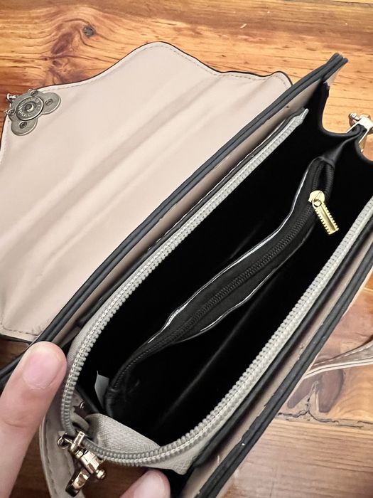 beige handbag with gold details