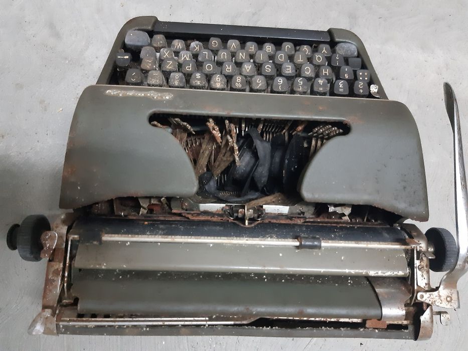 Maquina de escrever olympia