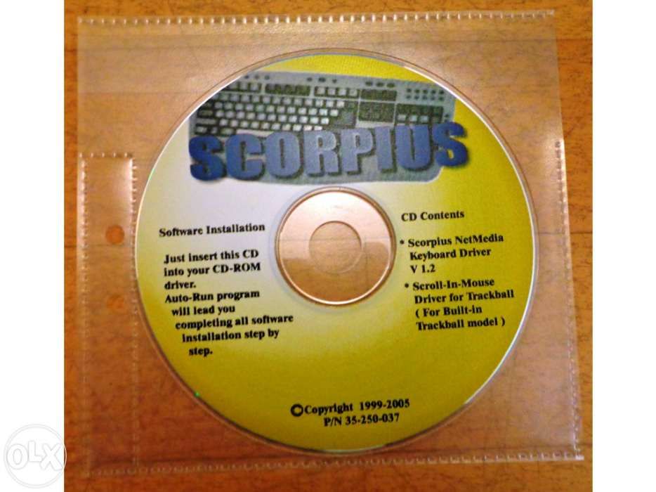 Teclado de computador com CD de instalação